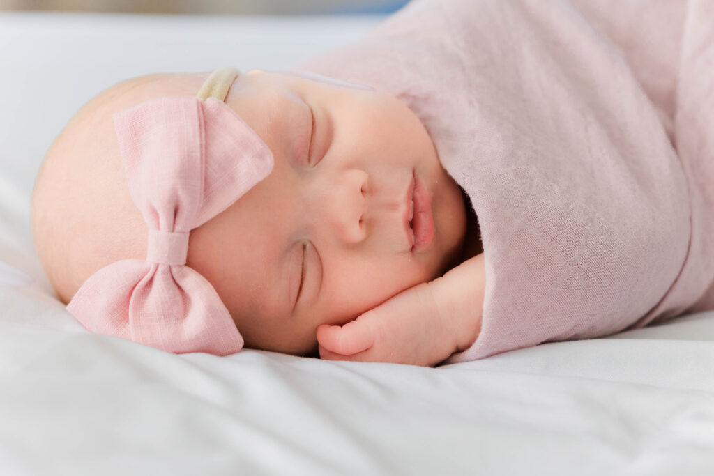 Swaddled baby sleeping at Columbus Twin Newborn Photography