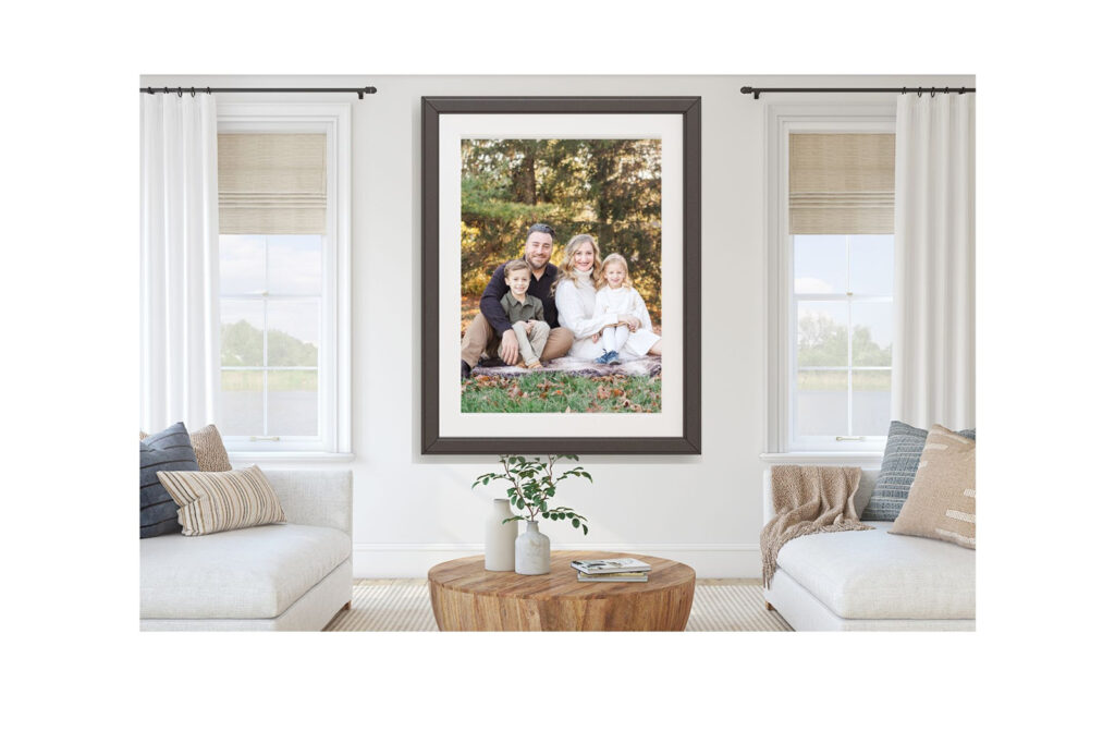 an image from a family mini-session is displayed on a wall
