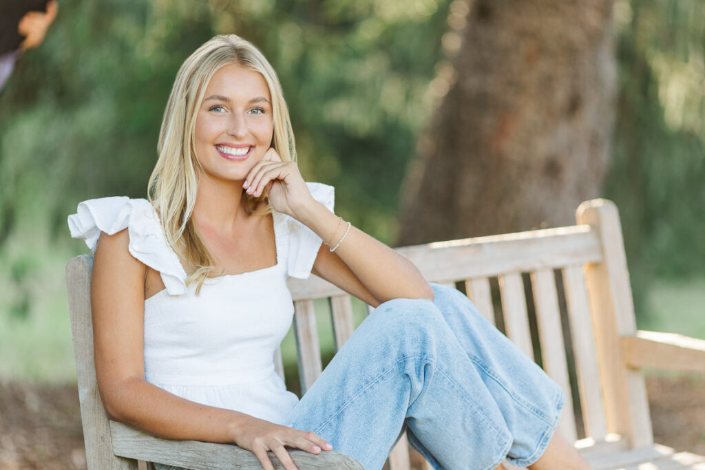 Columbus High School Senior sitting on bench during senior session
